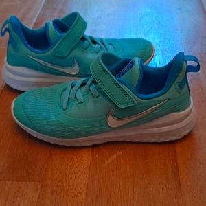 Girls teal Nike Renew RIVAL shoes size 12c. Used once